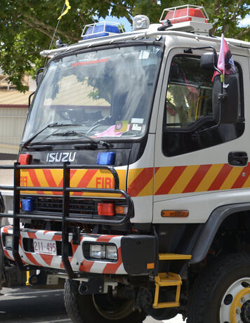 Audience and sponsors at an awards ceremony supporting emergency services